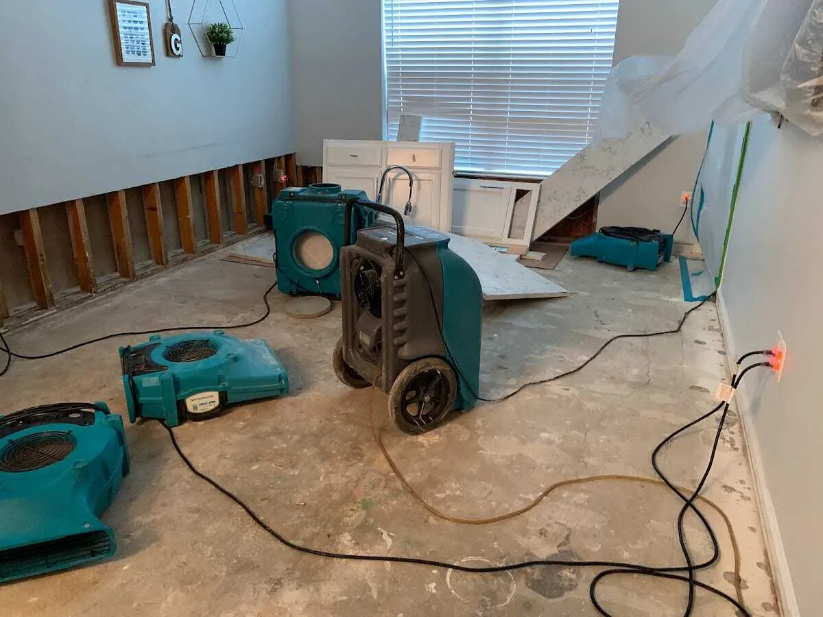 Dehumidifier in flood-cut room for Water Damage Restoration in Riviera Beach